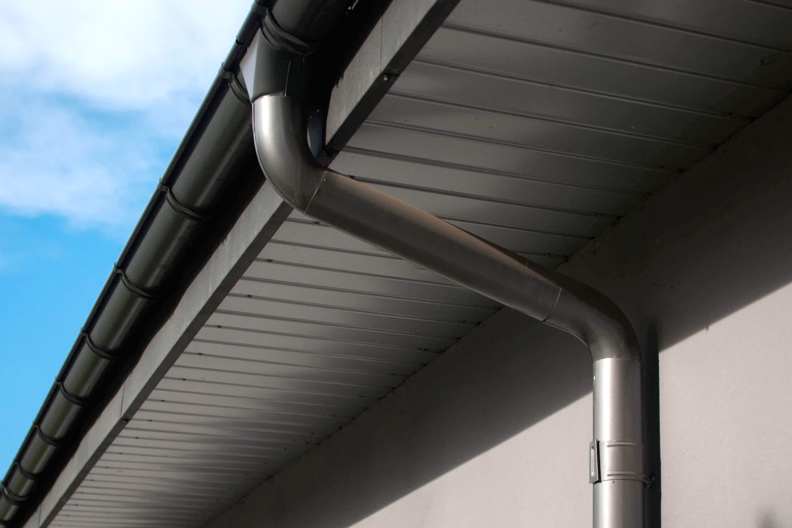 Corrosion-resistant galvanized gutters installed on a commercial building in San Jose